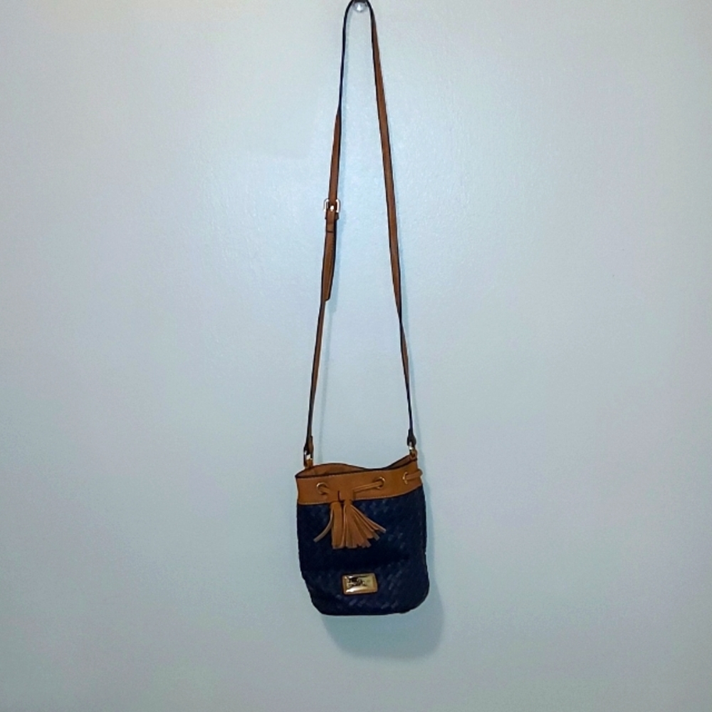 Navy blue small draw string purse.